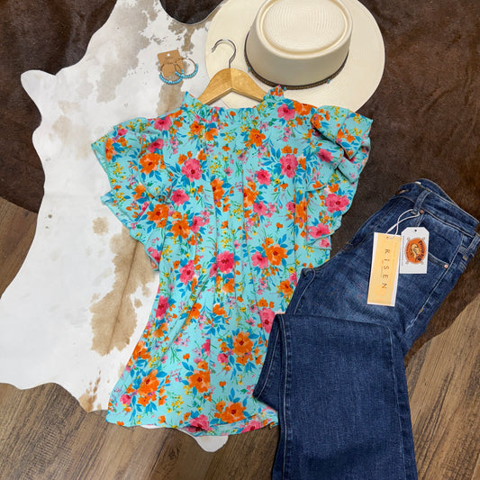Floral ruffle short sleeve top.