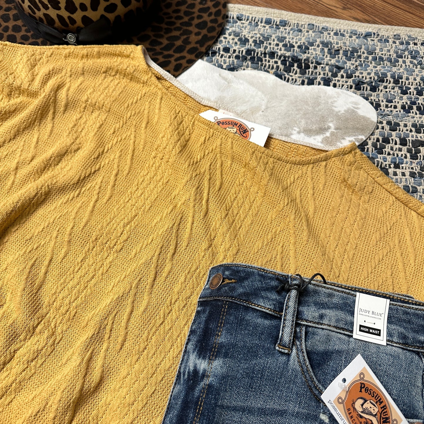 Close up of knit texture on shirt.