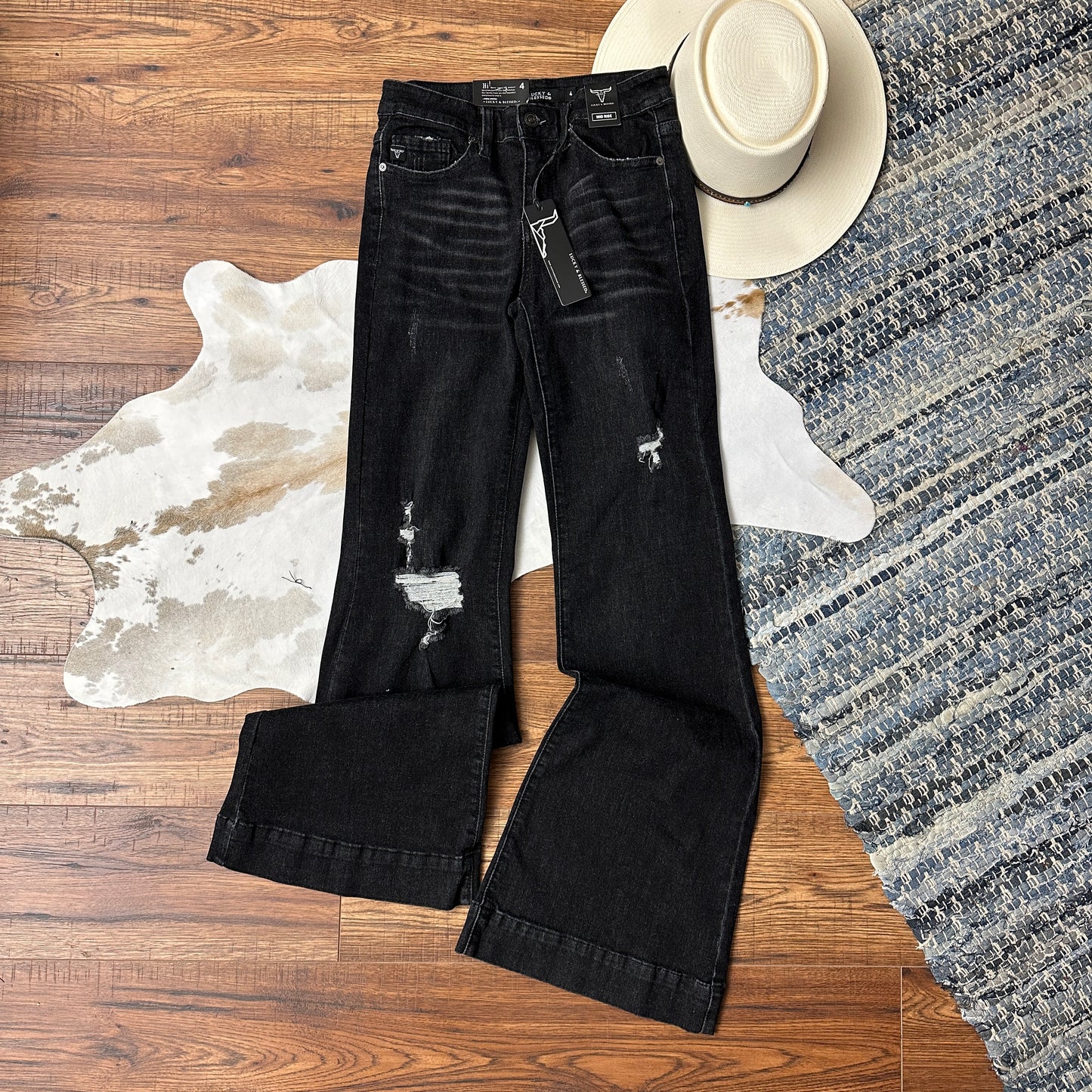 black washed lightly distressed trouser flares.
