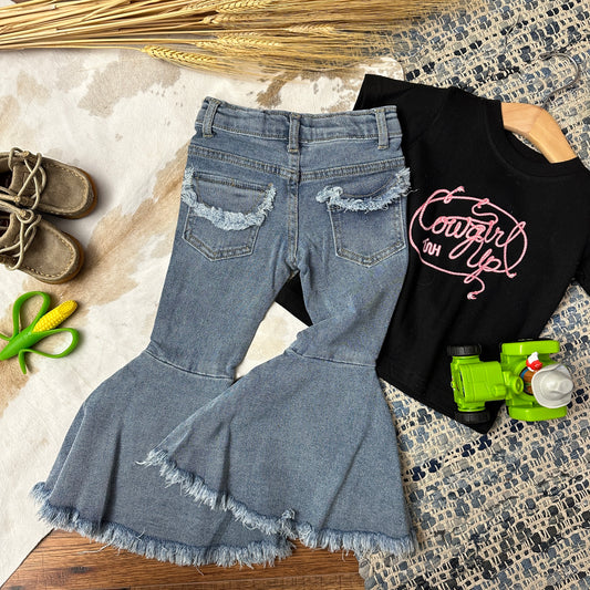 Frayed back pocket of denim.