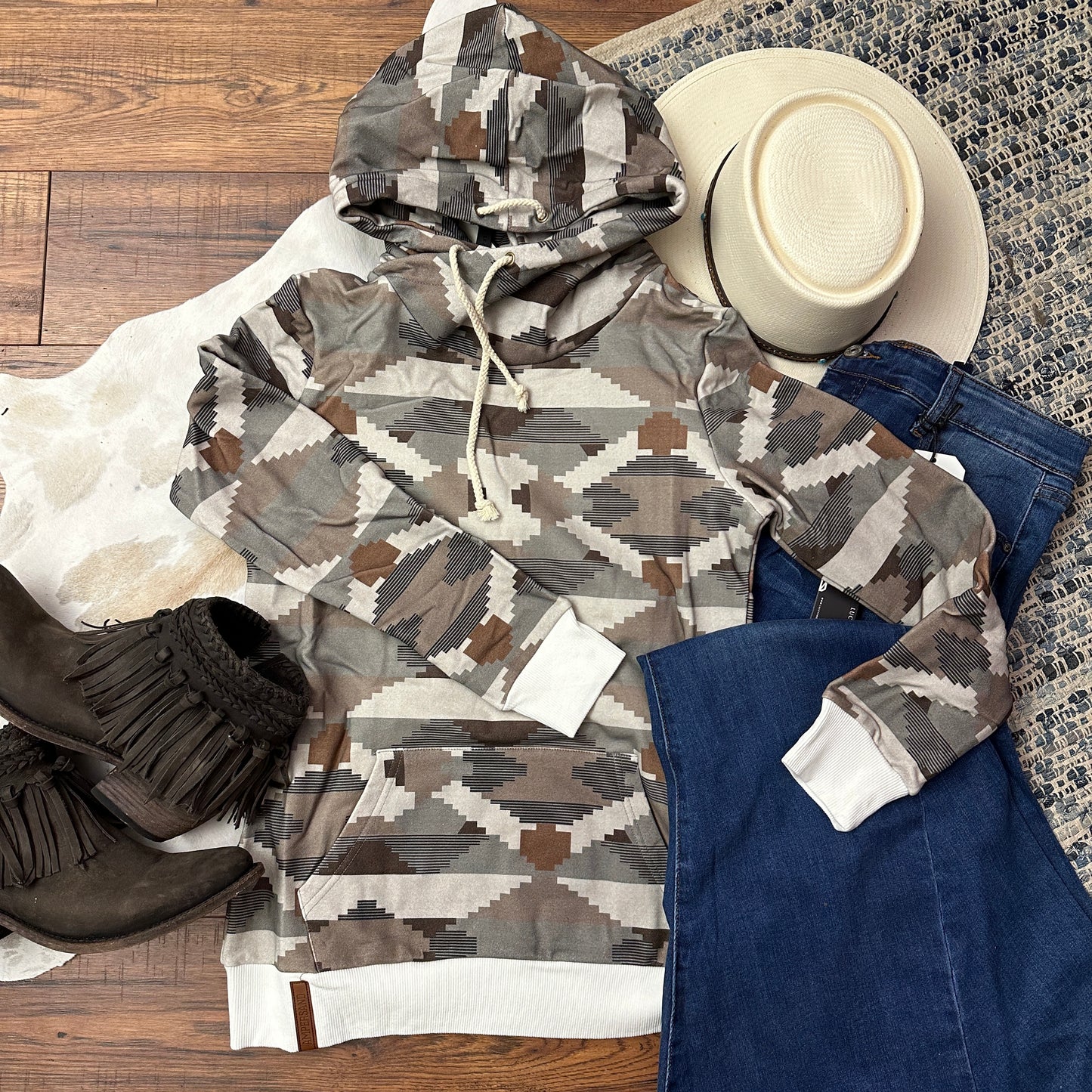 Neutral colored Aztec design on Ampersand's Singlehooded Sweatshirt