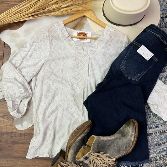 White top with light gray aztec design and 3/4 sleeves