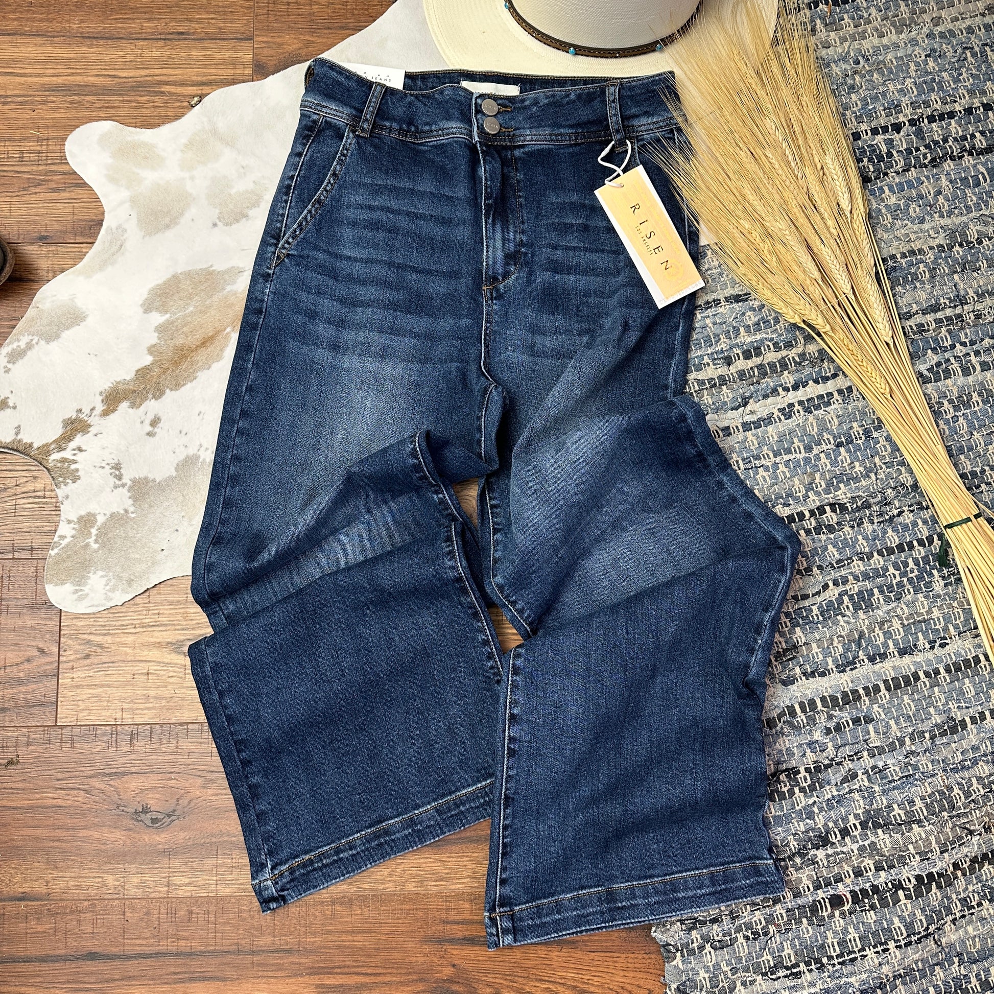 Dark wash wide legged denim.