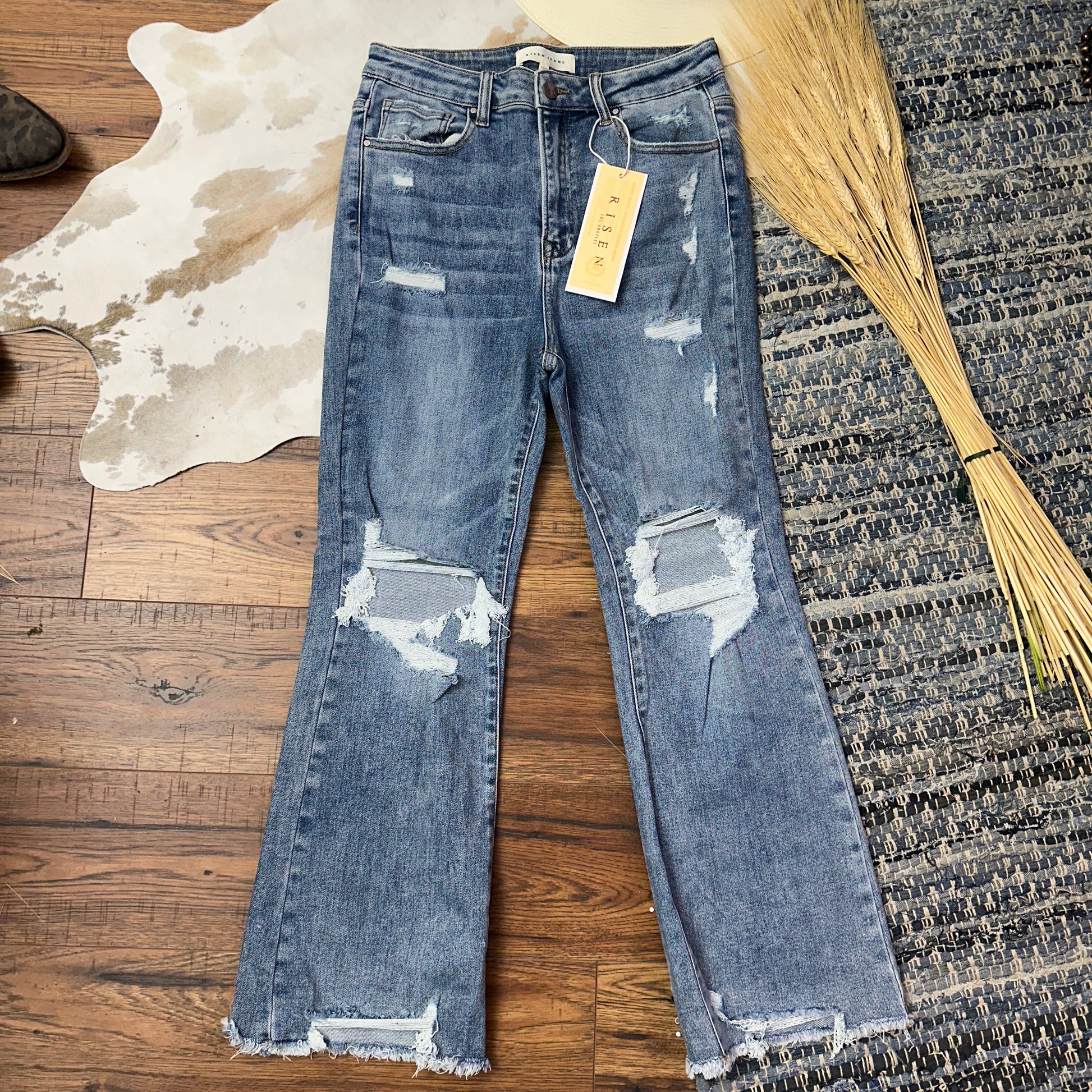Medium Wash destroyed ankle crop flares.