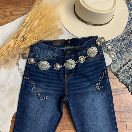 silver metal concho waist belt.