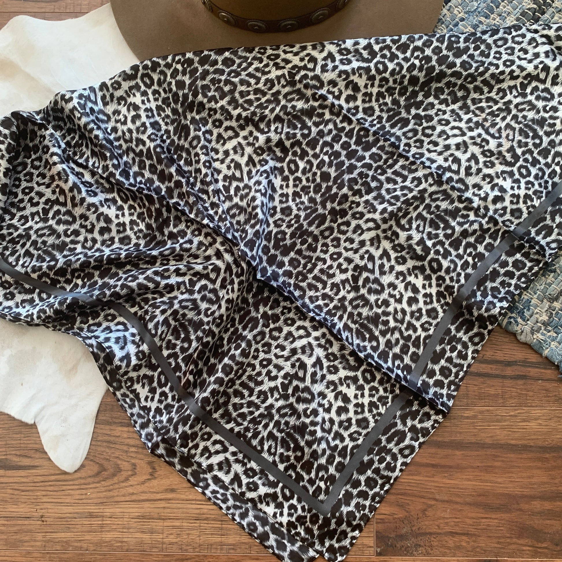 White leopard print with a gray border.