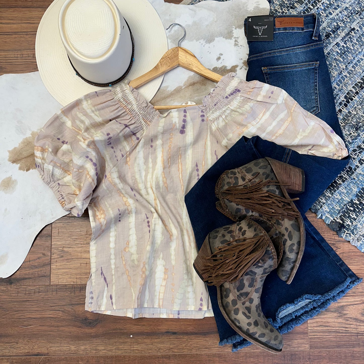 taupe linen top with orange, light green, and purple tie dye.