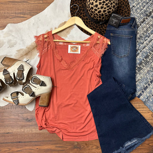 Dark marsala pink tank top with lace trim and shoulder caps.