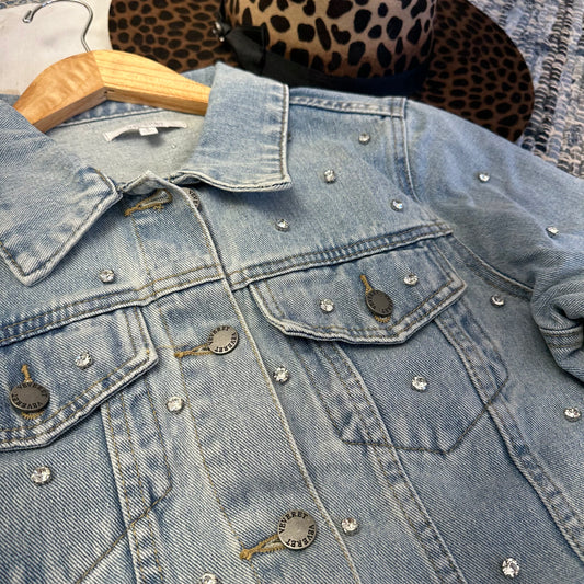 Close up of rhinestone embelishment.