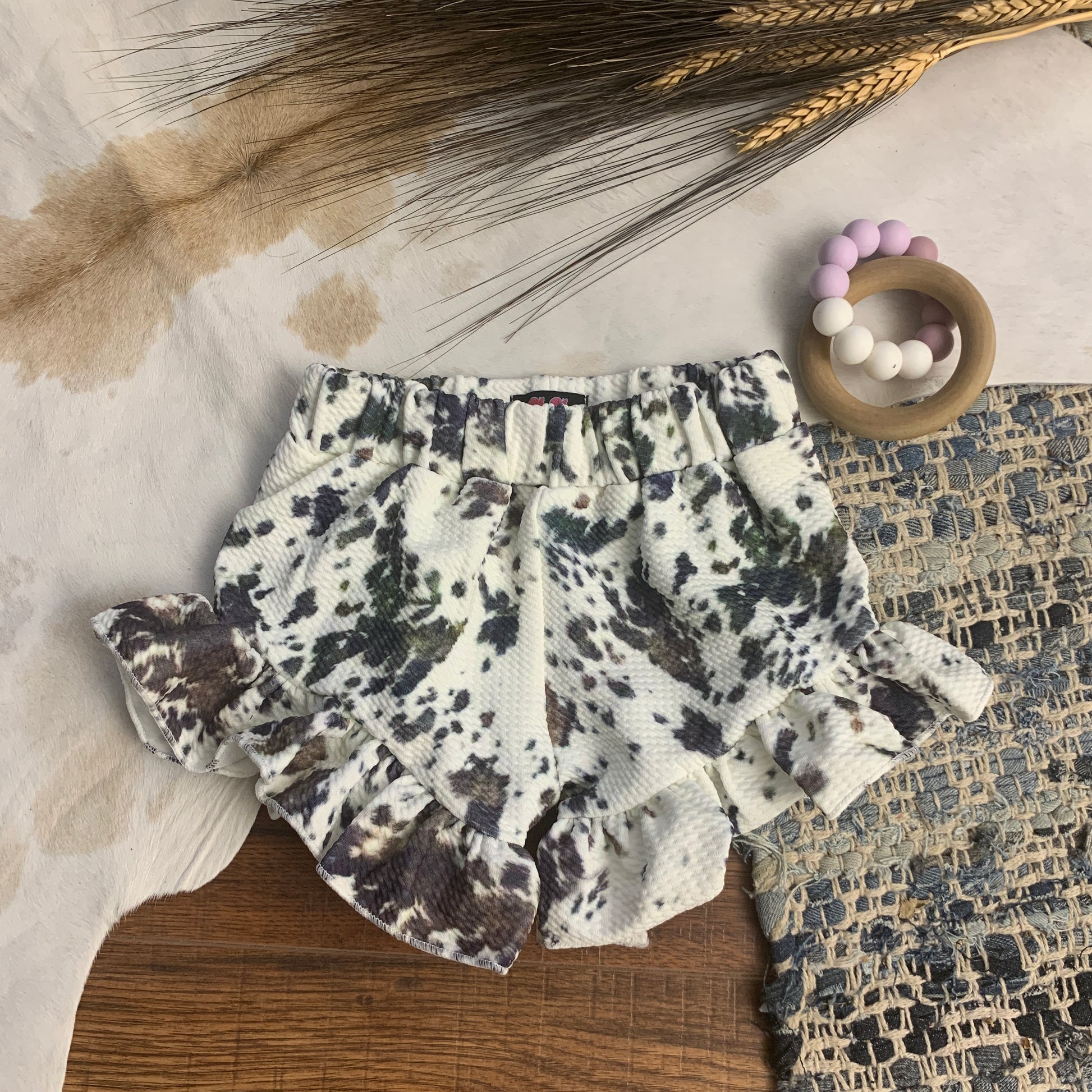 cow print ruffle shorts