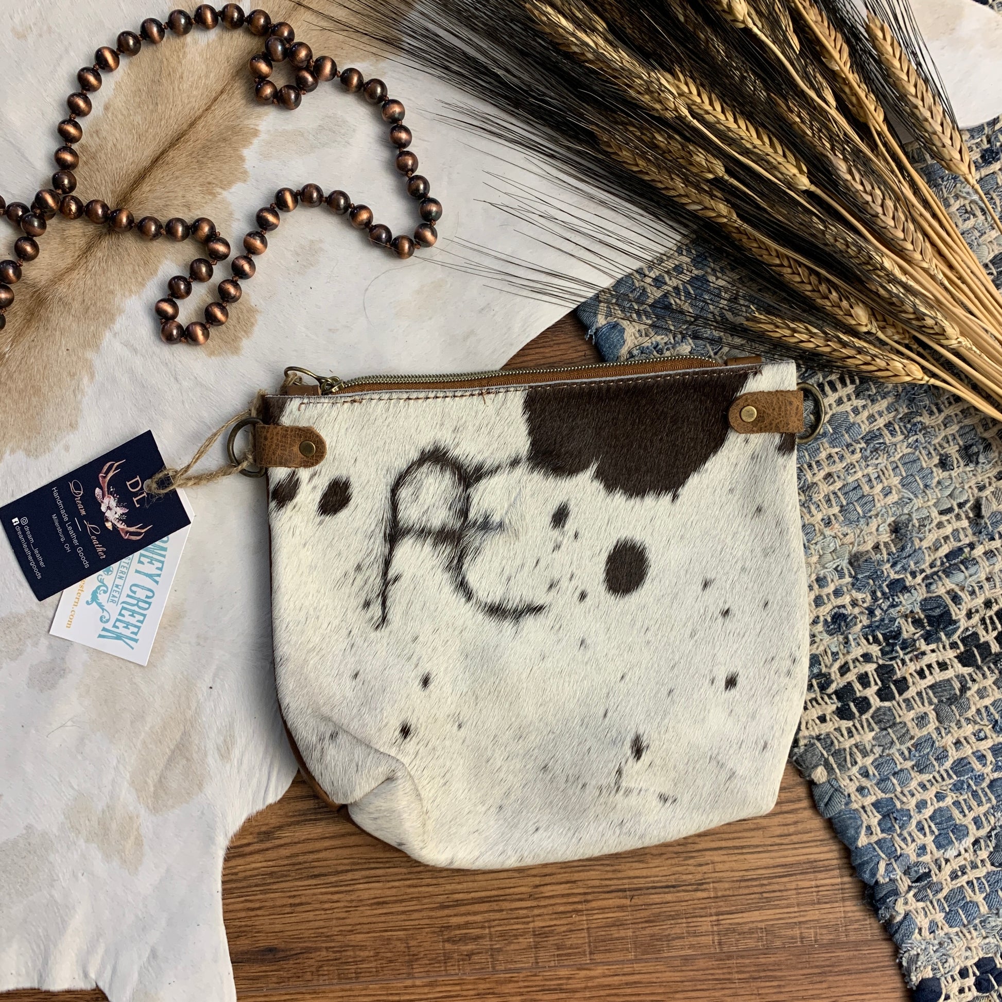 white and brown spots with AE branded bag.