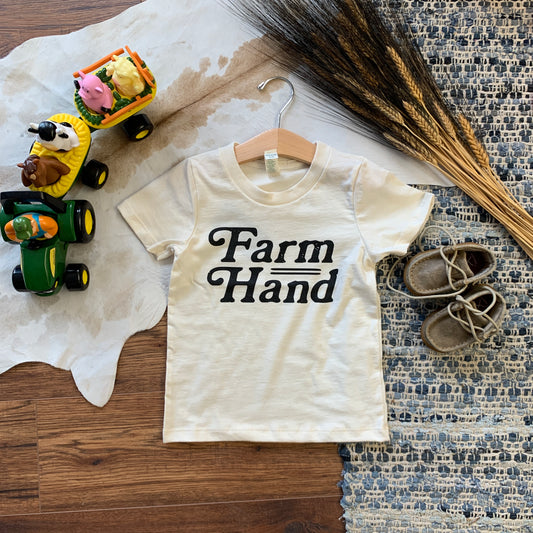 Cream crew neck shirt with "Farm Hand" in black ink.