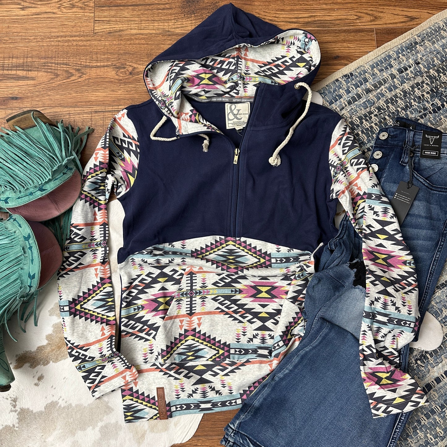 Navy and multi colored aztec quarter zip sweatshirt.