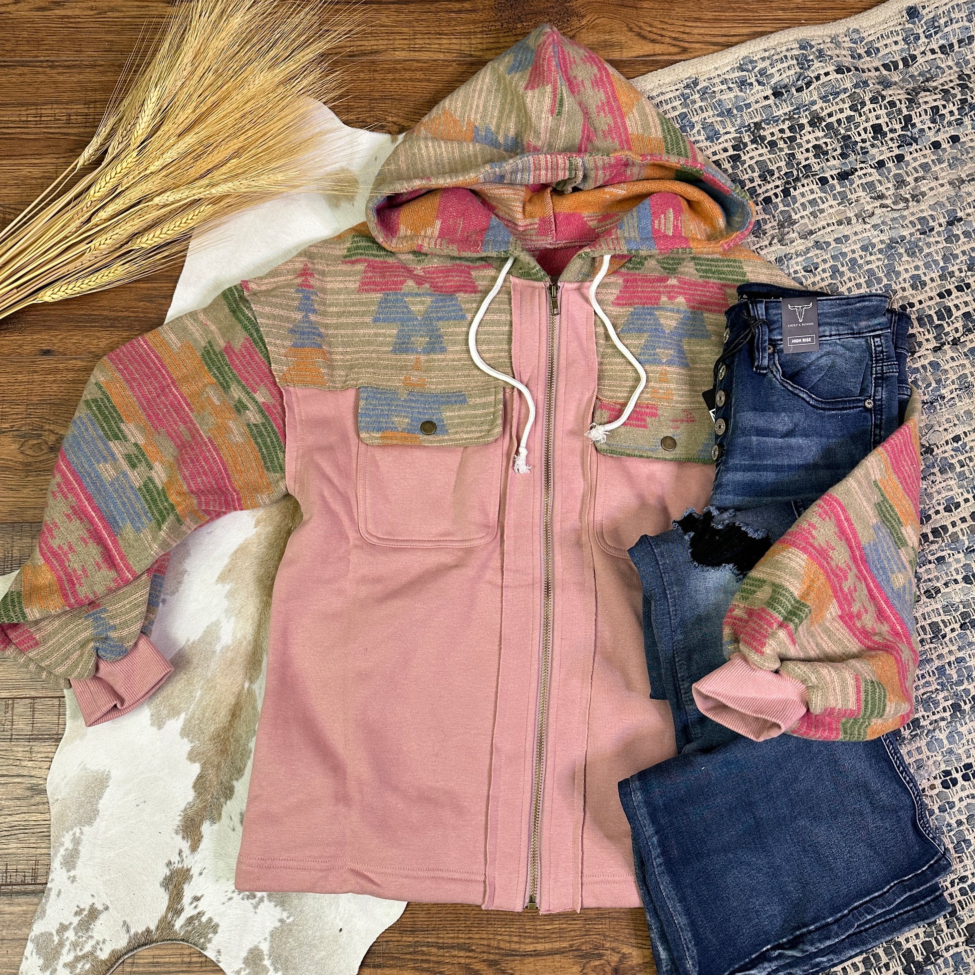 Multi colored aztec shacket with pink jersey body.