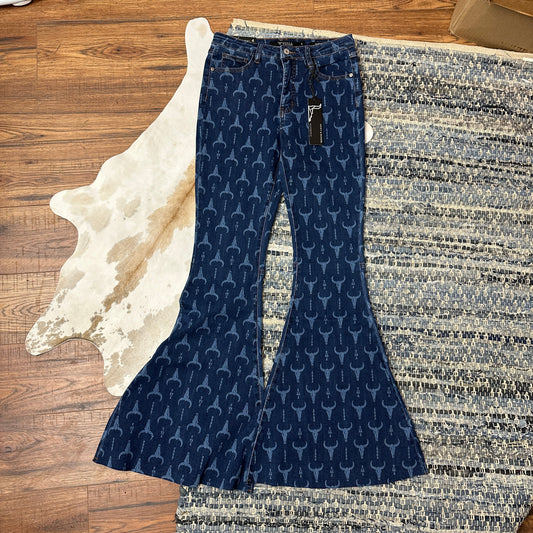 High waisted denim flares with lasered cowskulls all over.