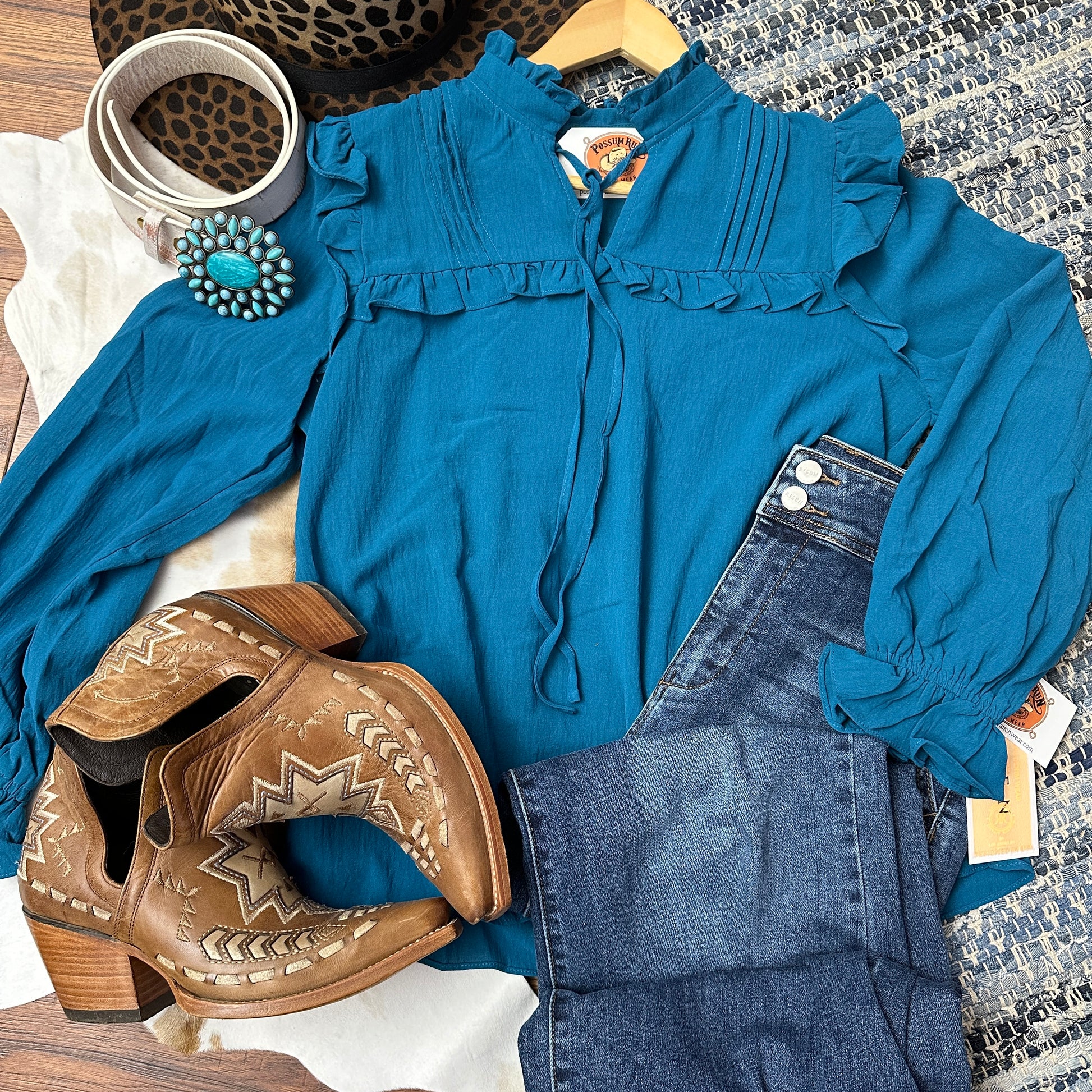 
teal blue peasant top with pintucked yoke.