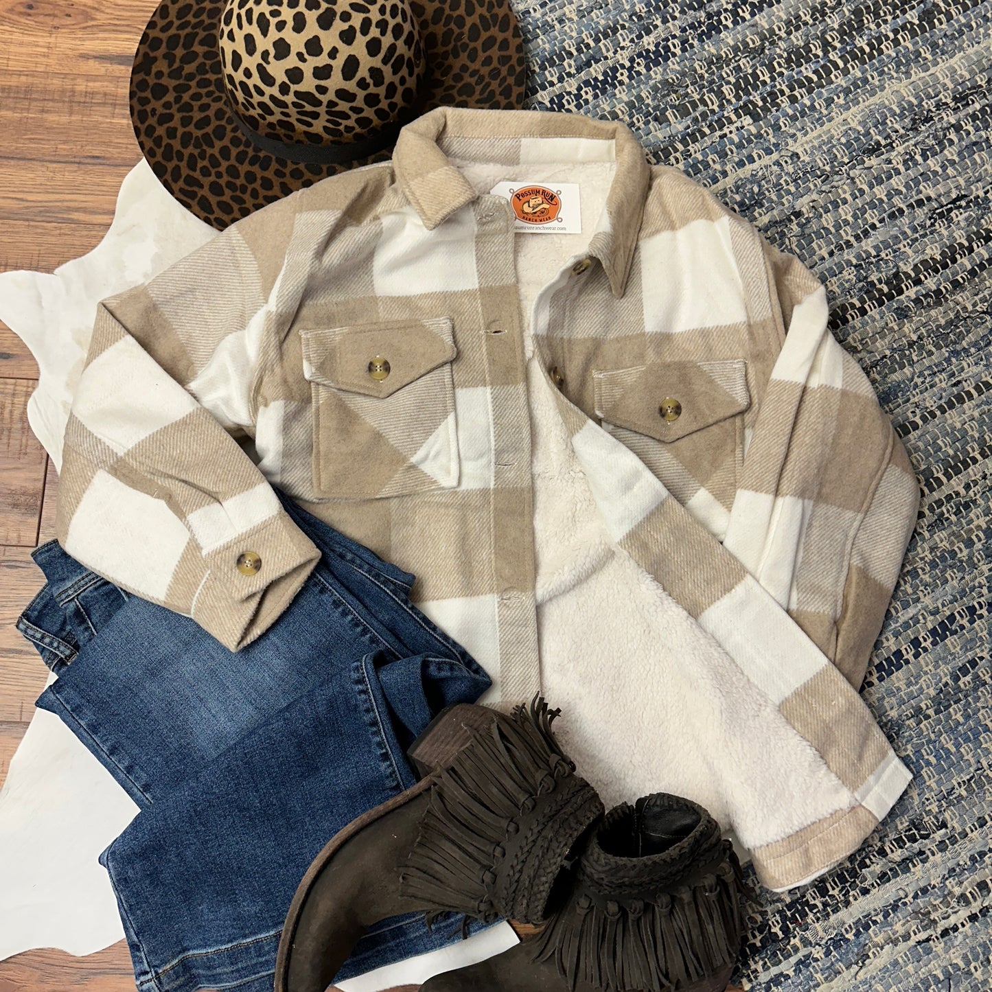 Taupe buffalo check sherpa lined shacket.
