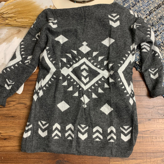 Back view of the cardigan's aztec design.