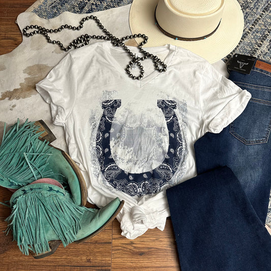 white v-neck tee with a paisley and horseshoe design