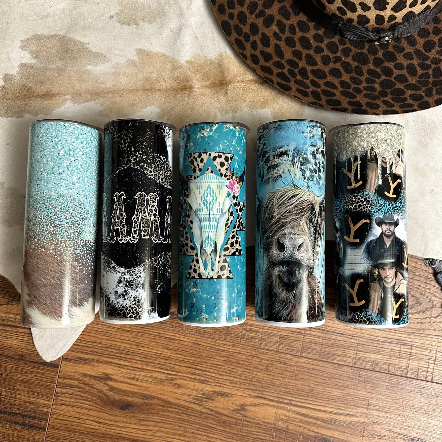 stainless steel tumblers with designs sublimated on them.