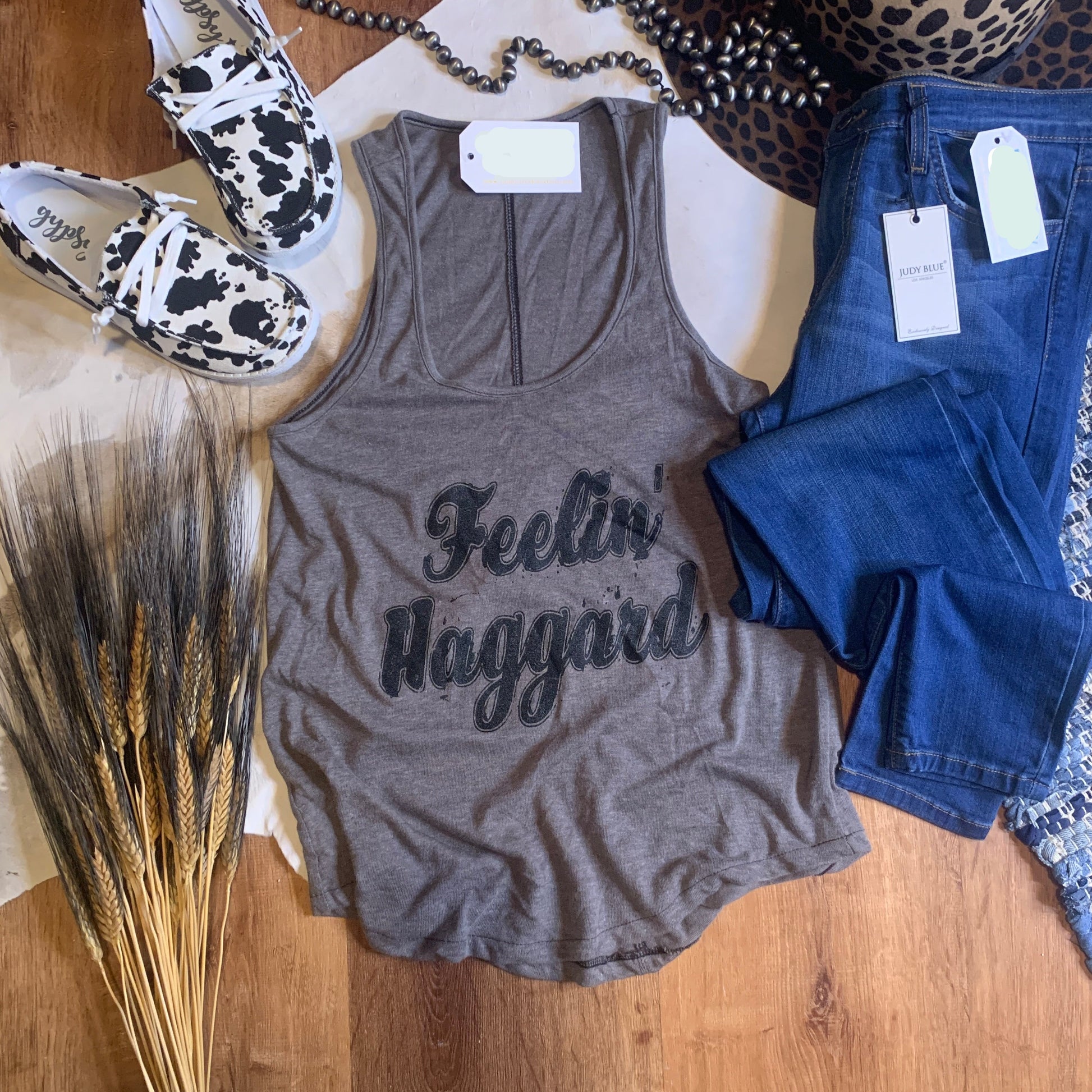 Gray racerback tank that says Feelin' Haggard in script.